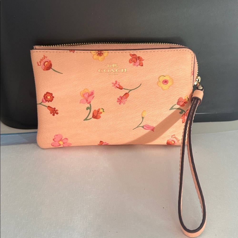 Coach Peach Floral Wristlet